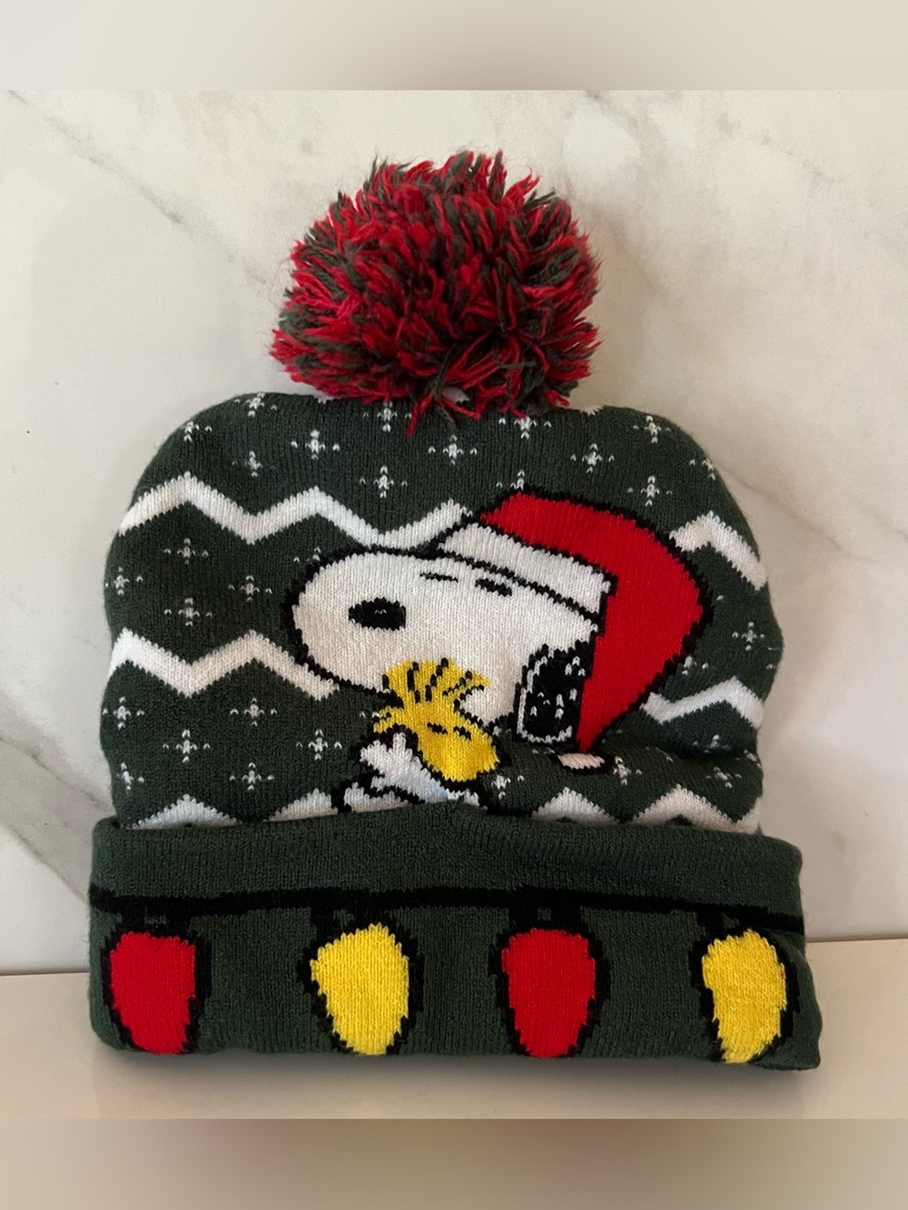 Peanuts Snoopy Kids Pom Pom Beanie Hat in Green and Red